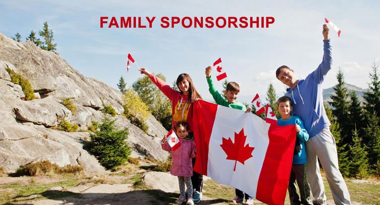 Happy family holding the Canadian flag and celebrating family sponsorship immigration program in Canada with the help of an immigration lawyer.